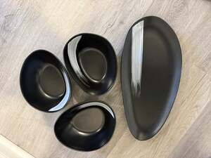 4 Oval Matte Black Dinning Set Organic Stone With A striking Hand Painted White